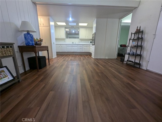 living room featuring dark hardwood / wood-style flooring