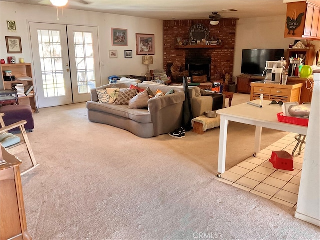 living room with french doors, carpet, and a fireplace