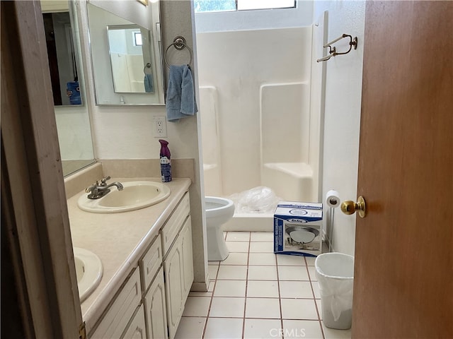 bathroom featuring walk in shower, vanity, toilet, and tile patterned flooring