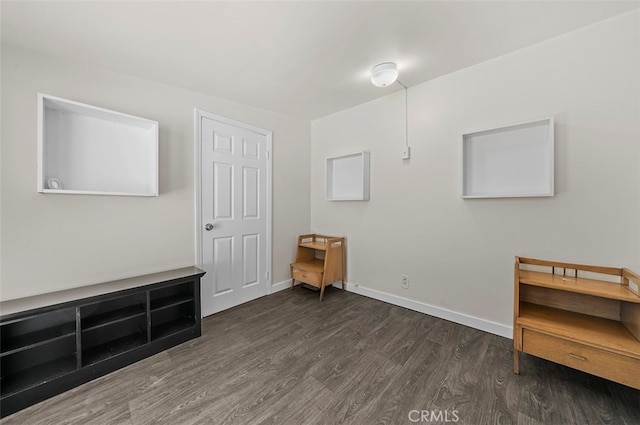 interior space with dark hardwood / wood-style flooring