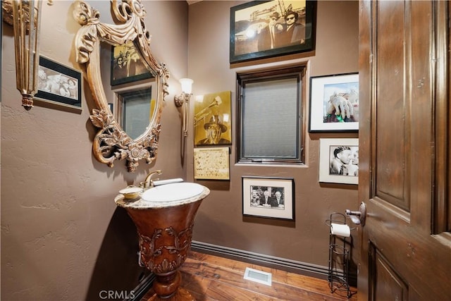 bathroom featuring hardwood / wood-style floors