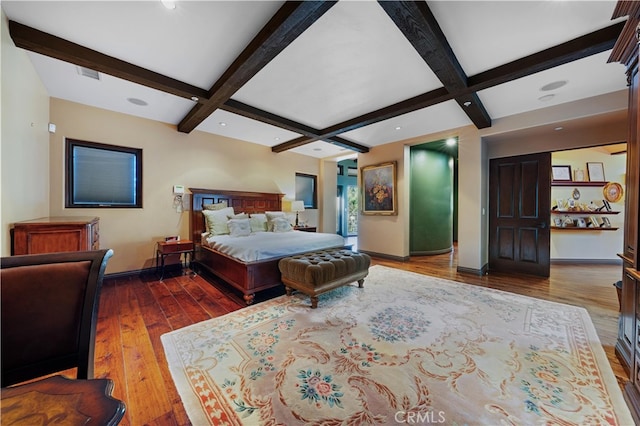 bedroom featuring dark wood-type flooring, coffered ceiling, and beamed ceiling