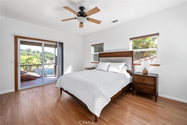 8865 San Gabriel Rd, Atascadero, CA 93422 - bedroom with access to exterior, baseboards, light wood finished floors, and ceiling fan