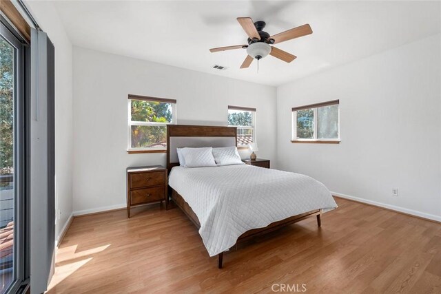 8865 San Gabriel Rd, Atascadero, CA 93422 - bedroom featuring light wood finished floors, baseboards, and ceiling fan