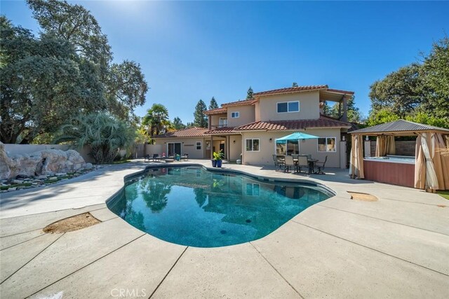 8865 San Gabriel Rd, Atascadero, CA 93422 - view of swimming pool with a hot tub, a patio, a gazebo, and outdoor dining space