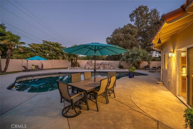 8865 San Gabriel Rd, Atascadero, CA 93422 - view of swimming pool featuring a fenced backyard, a patio area, and outdoor dining space