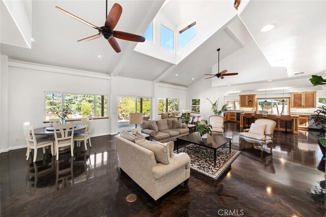 8865 San Gabriel Rd, Atascadero, CA 93422 - living room featuring ceiling fan, high vaulted ceiling, baseboards, plenty of natural light, and recessed lighting