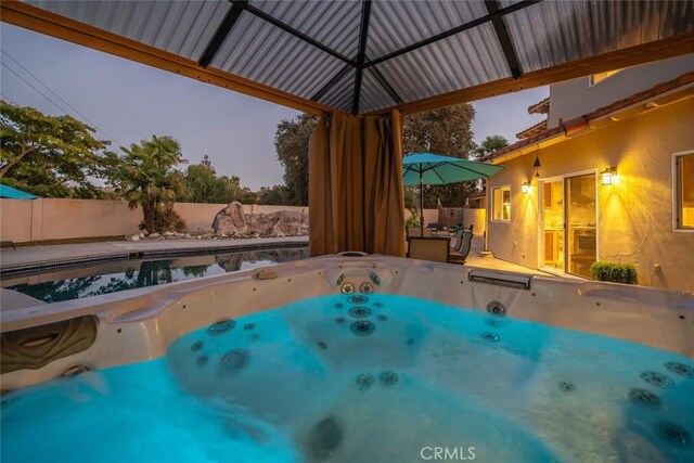 8865 San Gabriel Rd, Atascadero, CA 93422 - view of swimming pool featuring a hot tub and a fenced backyard