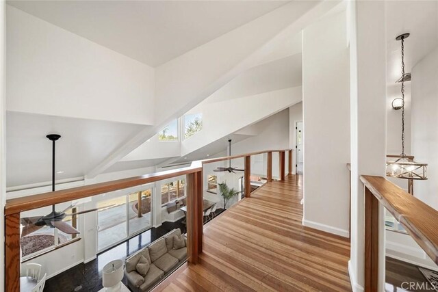 8865 San Gabriel Rd, Atascadero, CA 93422 - hall featuring baseboards, wood finished floors, and a high ceiling