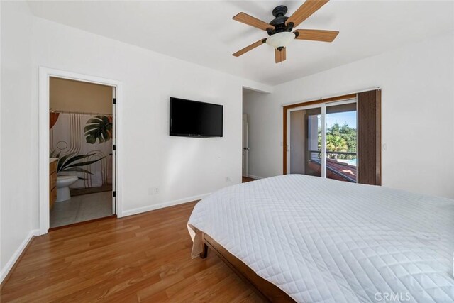 8865 San Gabriel Rd, Atascadero, CA 93422 - bedroom with access to exterior, wood finished floors, baseboards, ceiling fan, and connected bathroom