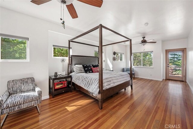 8865 San Gabriel Rd, Atascadero, CA 93422 - bedroom featuring wood finished floors, baseboards, ceiling fan, and access to exterior
