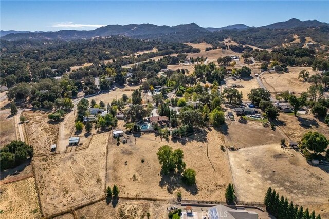 8865 San Gabriel Rd, Atascadero, CA 93422 - aerial overview of property's location with a mountainous background and rural landscape