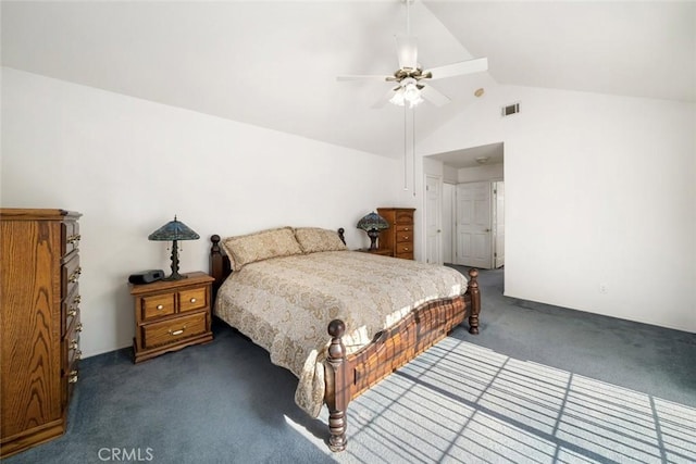 bedroom featuring ceiling fan, vaulted ceiling, and dark colored carpet