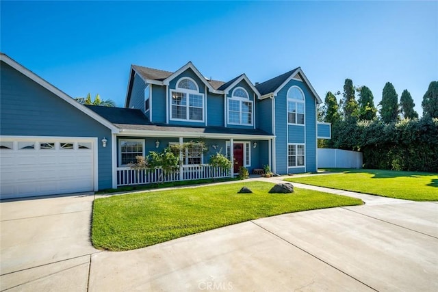 view of front facade featuring a garage and a front yard