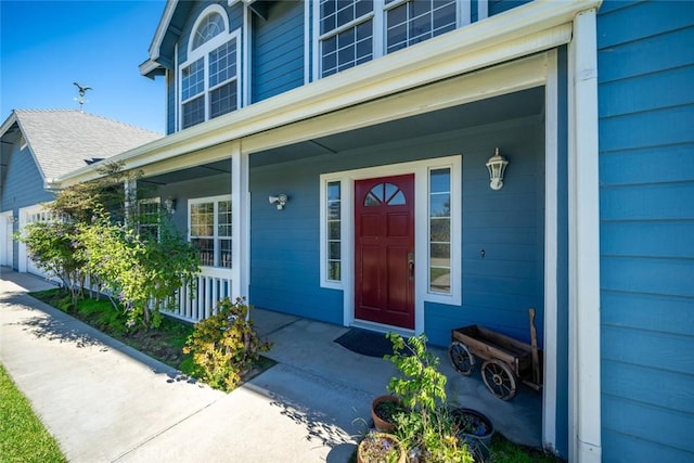 doorway to property featuring a porch