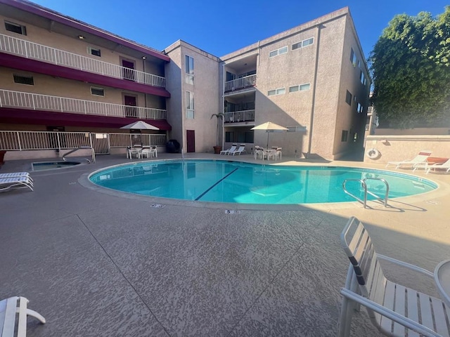 view of pool featuring a patio