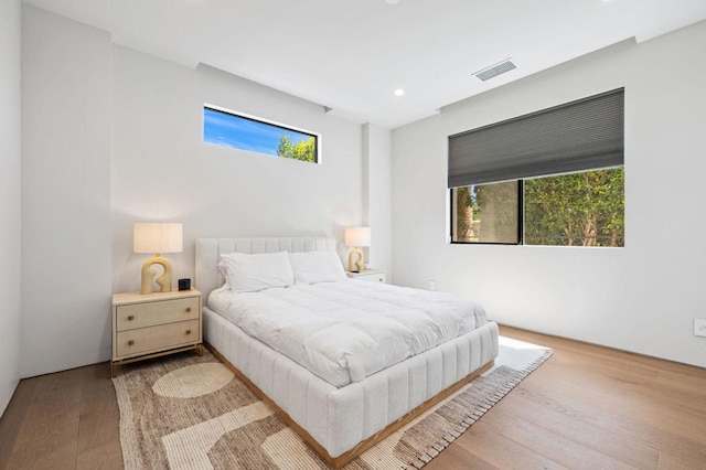 bedroom featuring light wood-type flooring