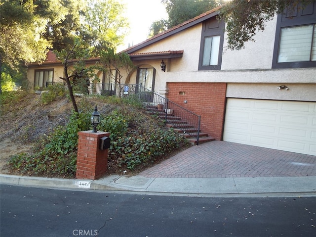 view of front of home featuring a garage