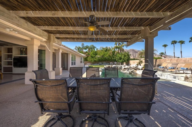 view of patio with ceiling fan