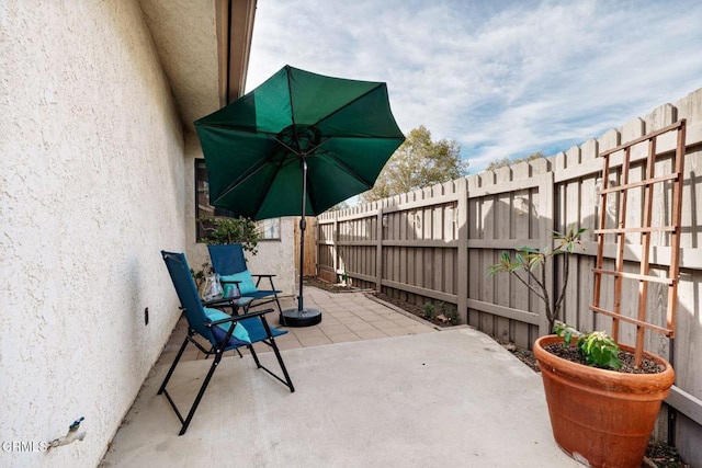 view of patio with a fenced backyard