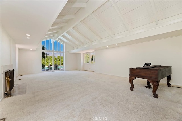 carpeted living room featuring high vaulted ceiling and beamed ceiling