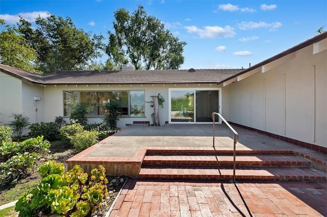 back of house featuring a patio area