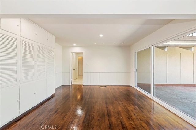 interior space with dark hardwood / wood-style flooring