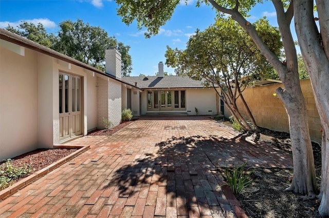 back of house featuring a patio area