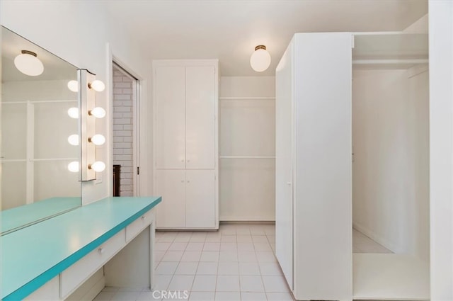 bathroom with tile patterned floors