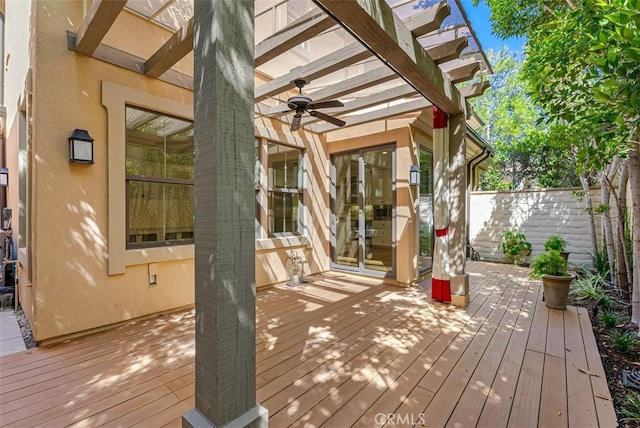 deck featuring a pergola and ceiling fan