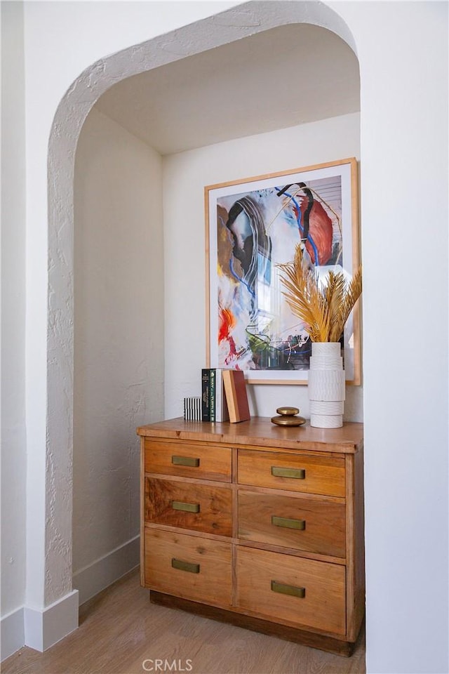 interior details featuring hardwood / wood-style flooring