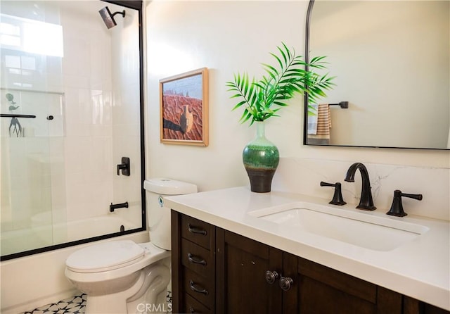 full bathroom featuring tile patterned flooring, bath / shower combo with glass door, toilet, decorative backsplash, and vanity