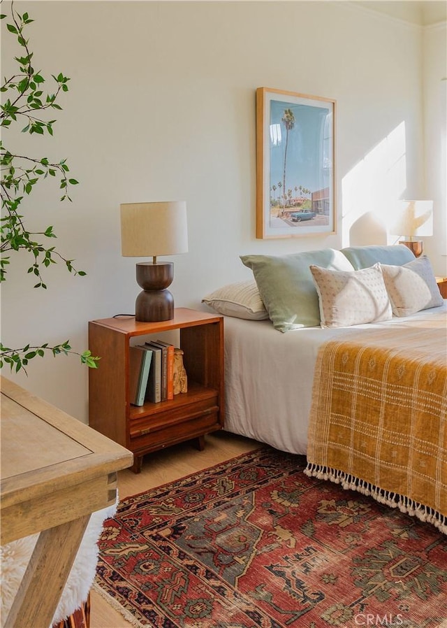 bedroom featuring hardwood / wood-style floors