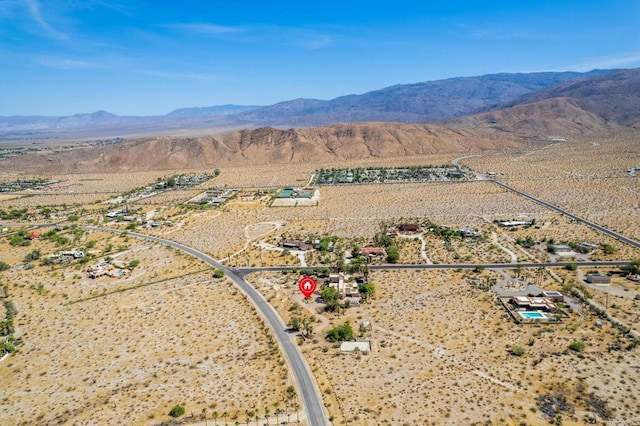 drone / aerial view featuring a mountain view