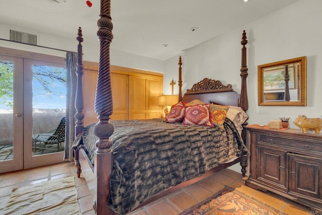 tiled bedroom with french doors and access to exterior