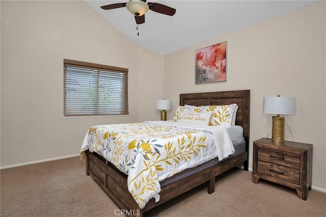 carpeted bedroom with ceiling fan and lofted ceiling