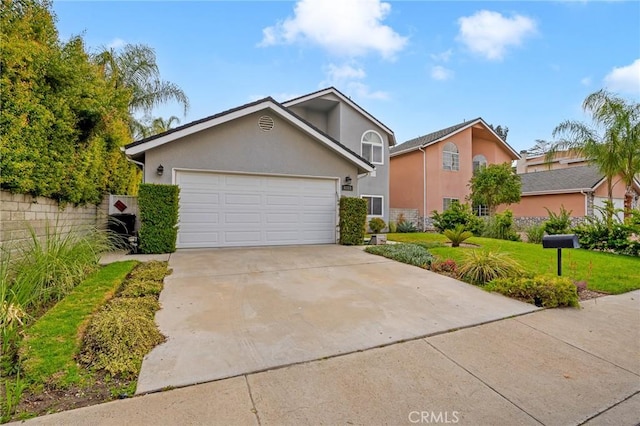 view of front facade featuring a garage and a front yard