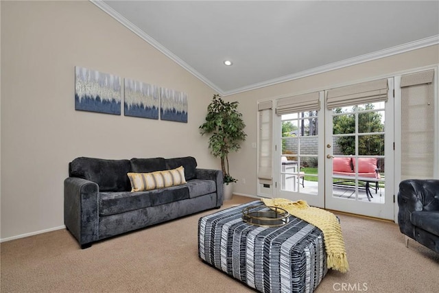 living room with crown molding, french doors, carpet, and lofted ceiling