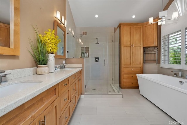 bathroom featuring separate shower and tub, tile patterned flooring, vanity, and vaulted ceiling