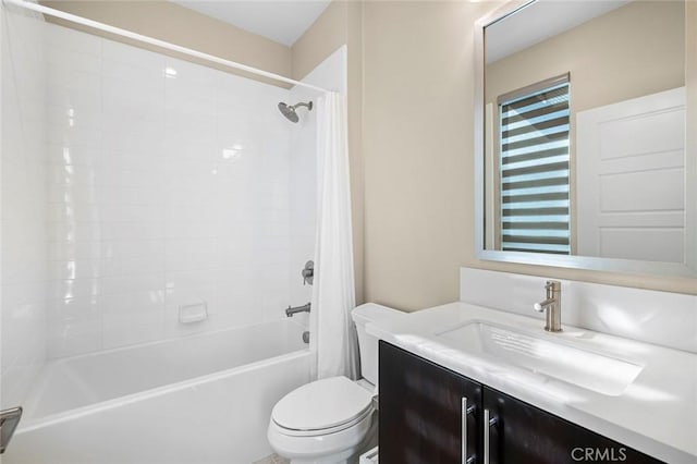 full bathroom with vanity, toilet, and shower / washtub combination