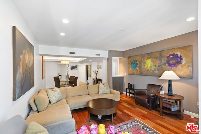 living room with hardwood / wood-style flooring