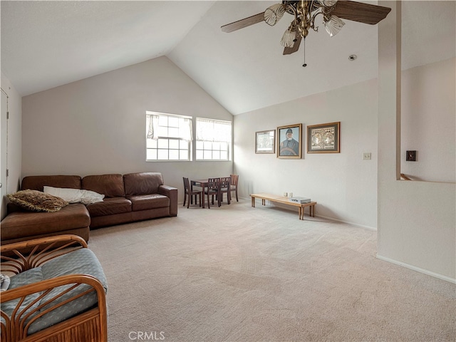 carpeted living room featuring lofted ceiling and ceiling fan