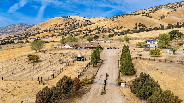 property view of mountains featuring a rural view