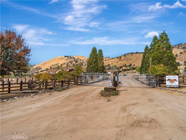 view of property's community featuring a rural view and a mountain view