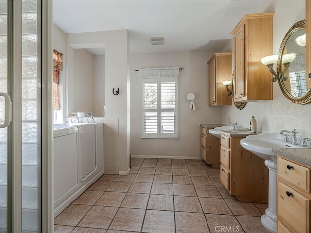 bathroom featuring vanity and tile patterned flooring