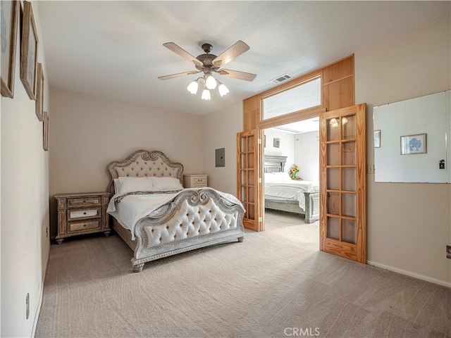 carpeted bedroom featuring ceiling fan