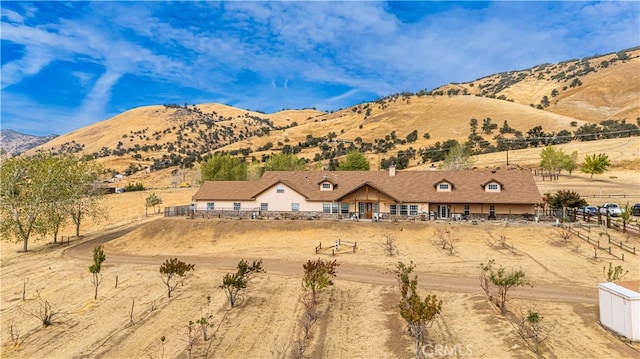 view of mountain feature with a rural view