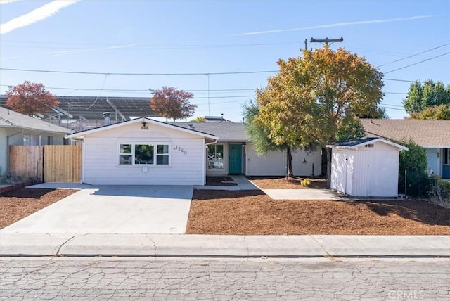 ranch-style house with a shed