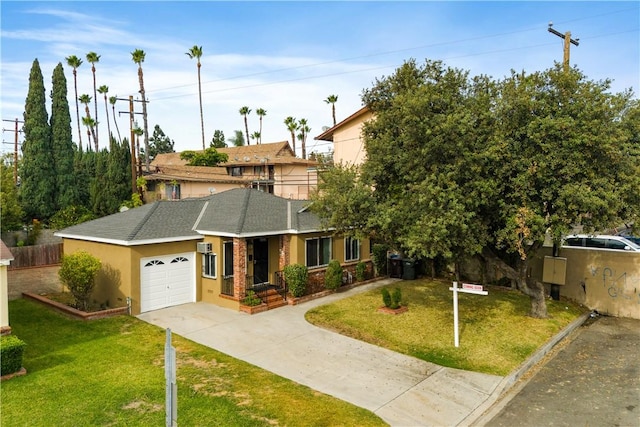 view of front of property with a garage and a front yard