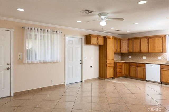 kitchen with backsplash, ceiling fan, dishwasher, light tile patterned flooring, and crown molding